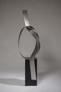 Joe Gitterman, "Poised 2", stainless steel, painted black metal base