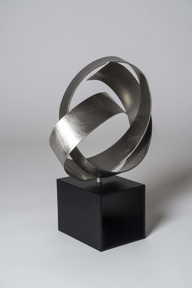 Joe Gitterman, "Round Knot," stainless steel, painted black metal base