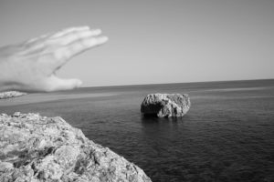 Rocks with Sea and Hand