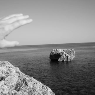 Rocks with Sea and Hand
