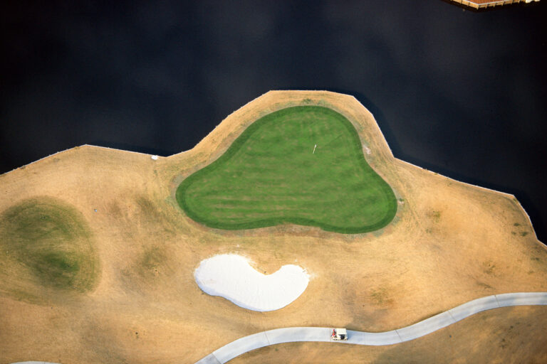 Alex Maclean, "Golf Course Green at Water's Edge, Ft. Walton, FL," chromogenic print